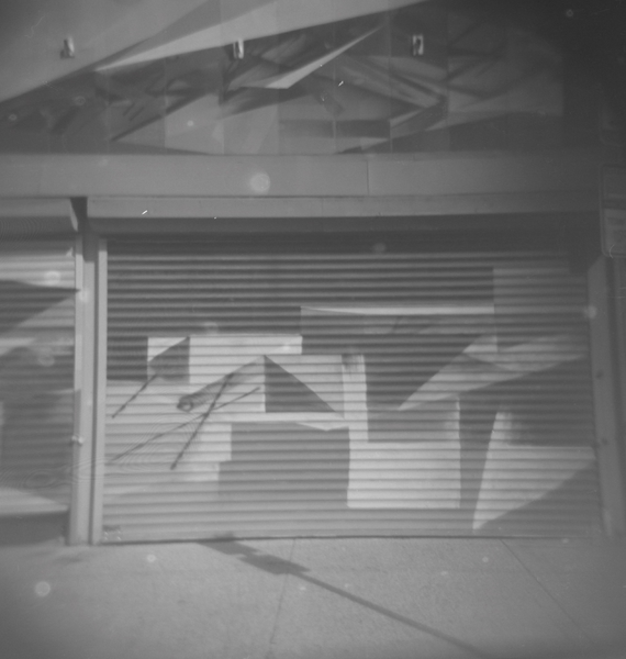 Small photo of Garage Door on Weird Art Space