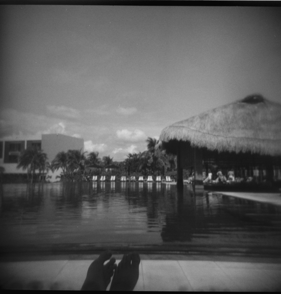 Small photo of View of the pool from a lounge chair